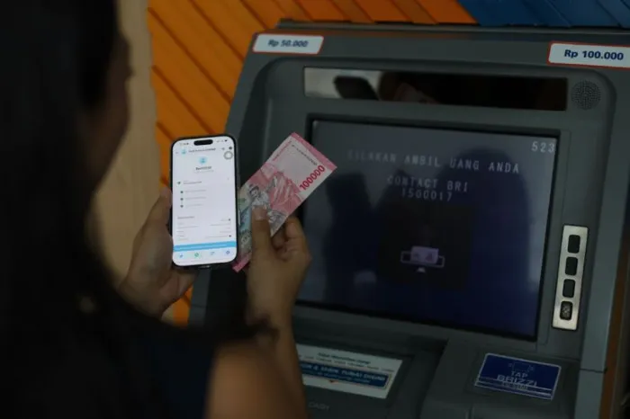 Langkah-langkah tarik tunai saldo GoPay tanpa kartu di mesin ATM
